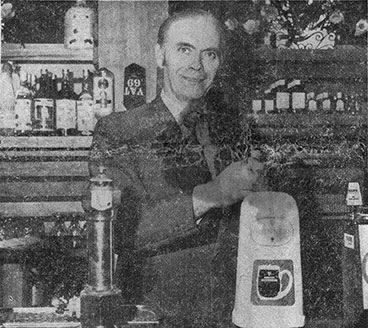 Interior view of the Bon Accord with Peter Gallagher pulling a pint at the opeing 1971.